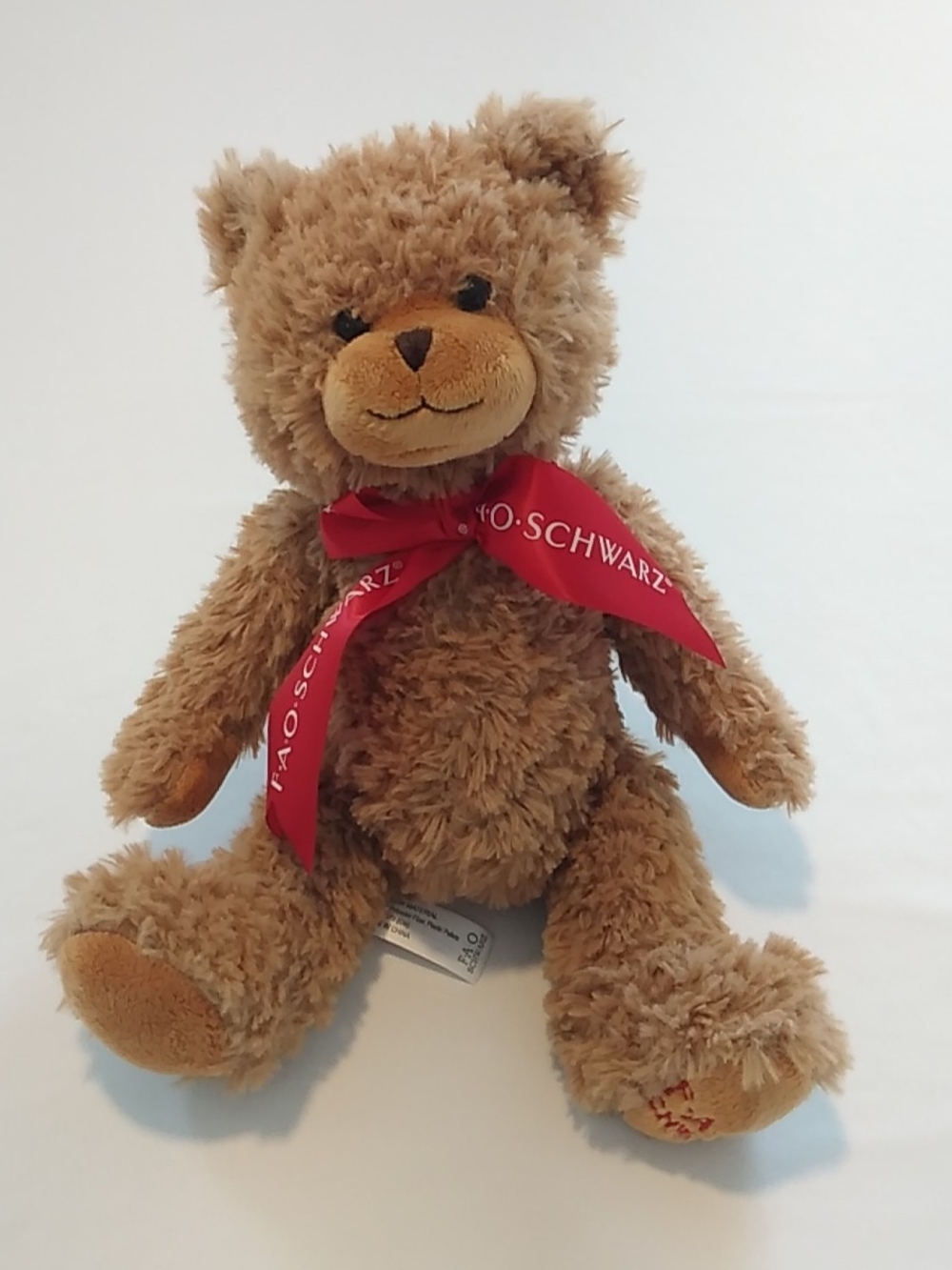 FAO Schwarz Plush Light Brown Teddy Bear with Red Ribbon